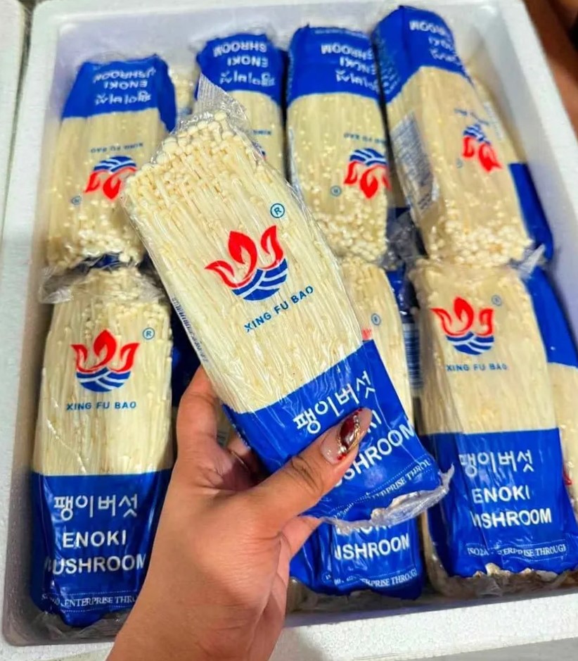 Box of fresh enoki mushroom packs from an Iloilo City seller
